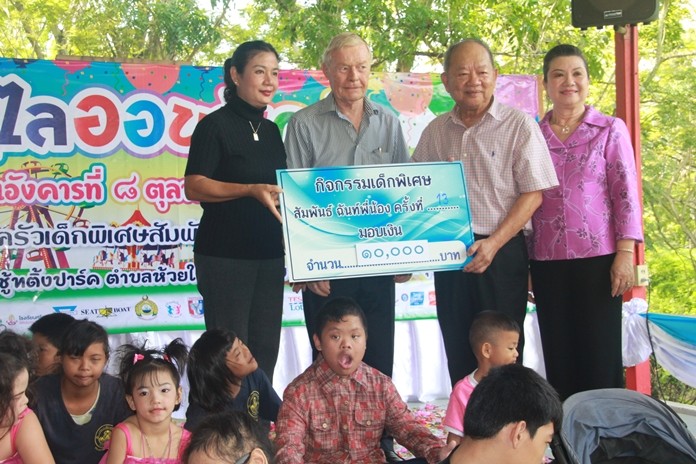 Mr. Wolfgang donates 10,000 baht.