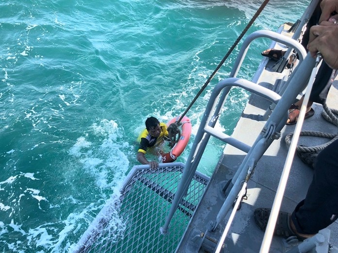 The navy rescued Burmese fisherman Toonyee after he fell off a fishing boat and bobbed in the sea for 10 hours.