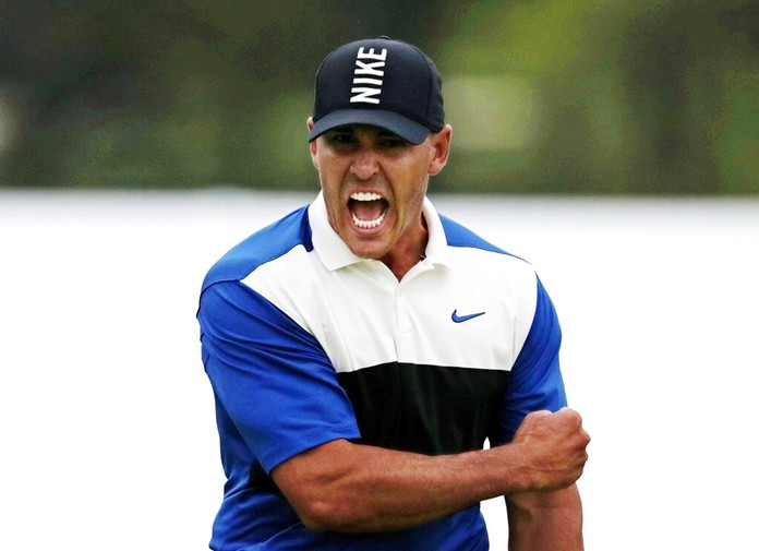 Brooks Koepka reacts after sinking a putt on the 18th green to win the PGA Championship golf tournament, Sunday, May 19, 2019, at Bethpage Black in Farmingdale, N.Y. Koepka says his play out of an awkward lie on the 18th that led to par was one of his most important shots. (AP Photo/Charles Krupa)