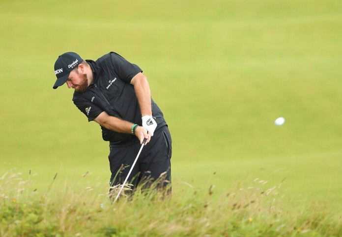 Ireland's Shane Lowry plays a shot from the 8th fairway during the final round of the British Open Golf Championships at Royal Portrush in Northern Ireland, Sunday, July 21, 2019. Lowry says this shot gave him confidence he could handle any shot in the final round. (AP Photo/Peter Morrison)