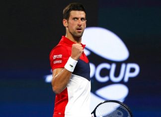 Novak Djokovic of Serbia reacts after winning a point during his match against Gael Monfils of France at the ATP Cup tennis tournament in Brisbane, Australia, Monday, Jan. 6, 2020. (AP Photo/Tertius Pickard)