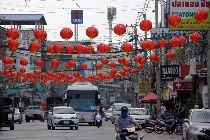 The roads in Naklua market are decorated with Chinese lanterns in preparation for Chinese New Year.