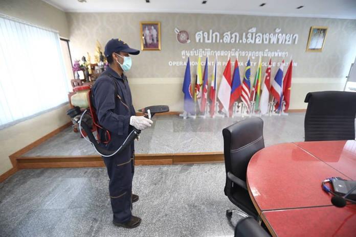 Pattaya health workers sprayed disinfectant in all the rooms of the Pattaya Police Station.