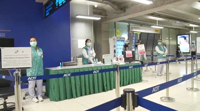 Staff at the ready to receive incoming passengers.