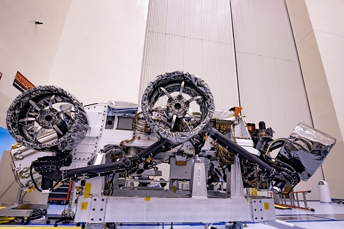 Wheels are installed on NASA’s Mars Perseverance rover inside Kennedy Space Center’s Payload Hazardous Servicing Facility on March 30, 2020. Perseverance will liftoff aboard a United Launch Alliance Atlas V 541 rocket from Cape Canaveral Air Force Station in July 2020. (Credits: NASA/JPL-Caltech)