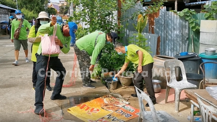 SSR teams pour abate into drains to reduce the spread of common house mosquitoes.