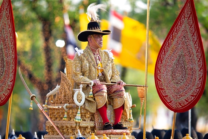 King Maha Vajiralongkorn Bodindradebayavarangkun is carried on a palanquin through the streets outside the Grand Palace for the public to pay homage during the second day of his coronation ceremony in Bangkok, Sunday, May 5, 2019.