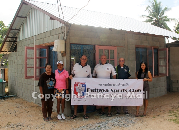 PSC members Nuan “Noodle” Russell, Charity Chair Noi Emmerson, Social Chair Stan Rees, Dave Smith, PR, and Senior Advisor Nigel Cannon, formally hand over the property.