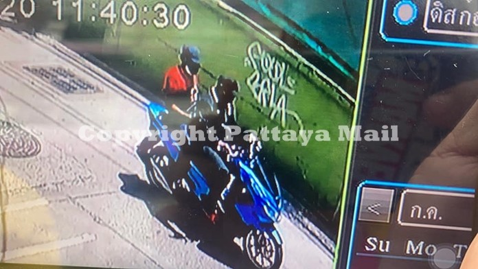 A grab from the city’s CCTV camera shows the two alleged gunmen speeding away.