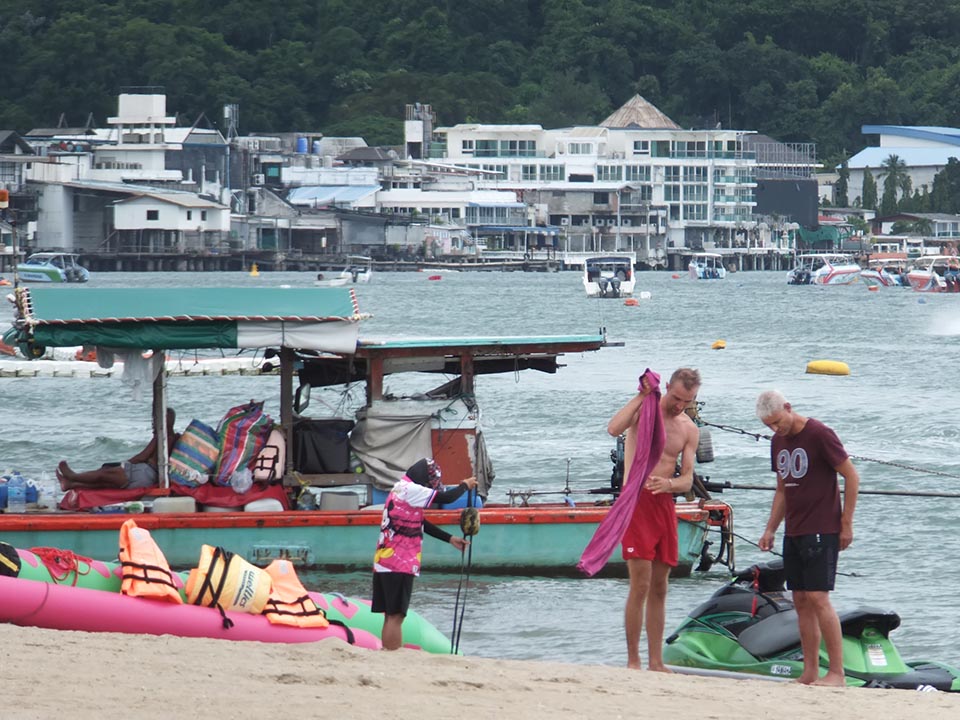 Tourists swap Thailand's beaches for cage fights