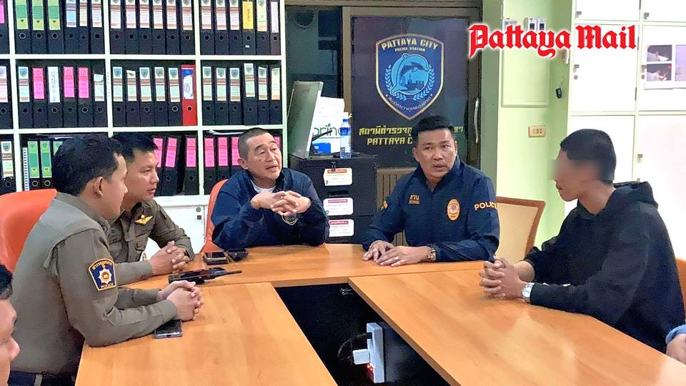 Pol. Col. Navin Teerawit (centre) interrogates Wachirawit, after his surrender at the Pattaya City Police Station, confessing to performing the wheelie in the Pattaya underpass. He faces multiple charges and potential prison time, highlighted by this arrest.